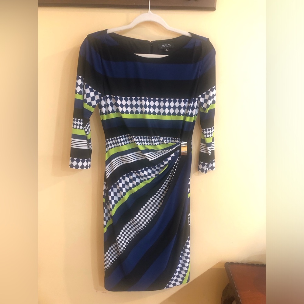 Tahari 3/4 sleeve pattern dress, size 4. Zipper closure and buckle accent.